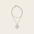 Alexander McQueen Oversized Medallion Necklace Alexander McQueen Oversized Medallion Necklace with double chain, logo engraved Medallion with aged look. Composition Brass