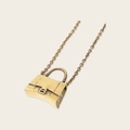 Balenciaga Bag Necklace Antique gold-tone necklace from Balenciaga.