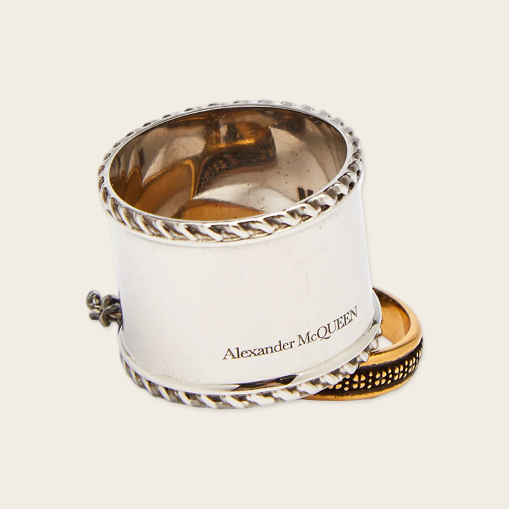Alexander McQueen Chained Rings Alexander McQueen Chained double ring with logo engraved Silver and aged yellow. Composition Brass
