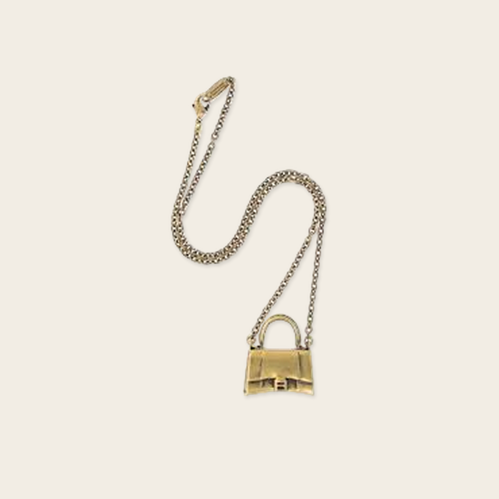 Balenciaga Bag Necklace Antique gold-tone necklace from Balenciaga.