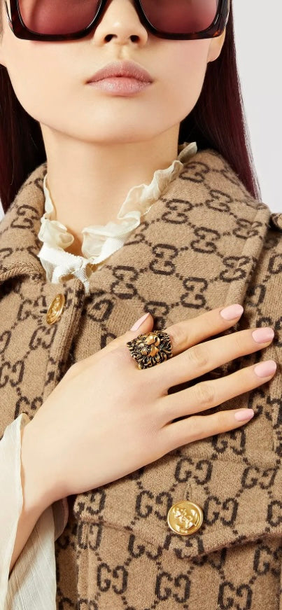 Gucci Lion Head Ring — model wearing
